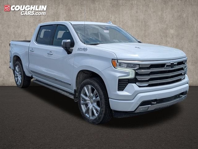 2026 Chevrolet Silverado 1500 High Country in Polar White Tricoat — front three-quarter view